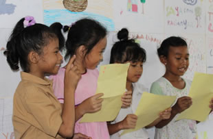 Community Development Jakarta - children singing